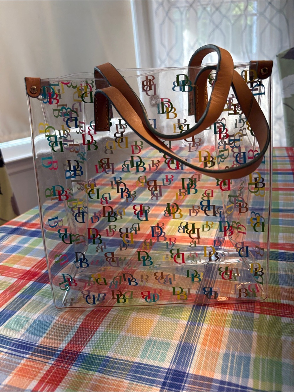 Dooney & Bourke Clear Multicolor Logo Tote with Tan Leather Handles